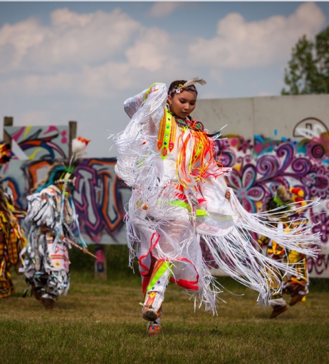A Lakota youth dances at the Red Can Graffiti Jam organized by the Cheyenne River Youth Project.